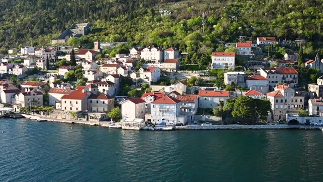 A Timelapse of a cruise ship leaving Kotor Montenegro and old mediterranean port.