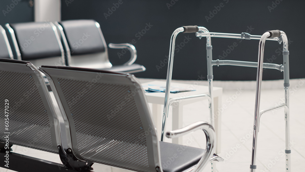Poster empty waiting room lobby at front desk, walk frame at diagnostic center with reception counter for h
