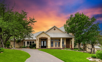 luxury home at sunset