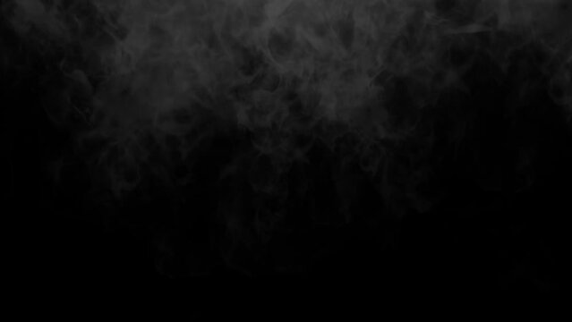 white smoke on a black background. Slow motion. Vape smoke. Vapor , fog, ice smoke cloud , realistic smoke cloud best for using in 4k composition.