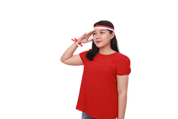 Young Indonesian girl celebrate indonesia independence day with respect gesture