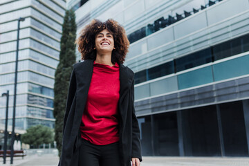 Fototapeta premium young African American business woman in city of Latin America, Hispanic and caribbean people with afro hair