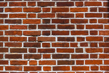 Obraz premium an old wall of old red brick, an old building, as a background 3