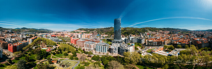 Aerial panoramic view of Bilbao, an industrial port city in northern Spain, is surrounded by green mountains, the de facto capital of Basque Country, Spain, Europe