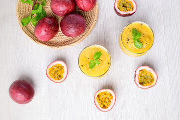 Fresh passion fruit smoothie drink in summer season, Table top view