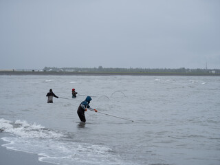fisherman dip netting for salmon on the Kenai Peninsula Alaska during the annual Native Alaskan Dip...