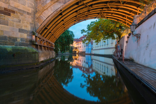 Reflections in Devil's Channel (Certovka) under Charles Bridge, Prague, Bohemia, Czech Republic (Czechia), Europe