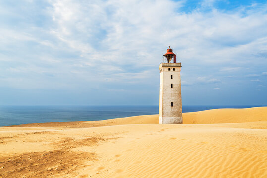 Rubjerg Knude lighthouse surrounded by sand dunes, Jutland, Denmark, Europe