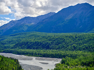 The rugged mountain and lush thick forests in the Matanuska Valley and near the Matanuska glacier in Alaska