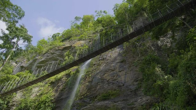 Bridge over a waterfall in Ghana