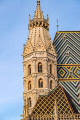 Fototapeta na wymiar St. Stephen's Cathedral, a Roman Catholic Romanesque and Gothic cathedral, built in 1365. The most important religious building in Vienna, with its multi-colored tile roof. Austria, 2018
