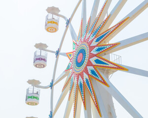Photograph of the Ferris wheel ride, located in Sunset Park La Libertad, El Salvador. built by...