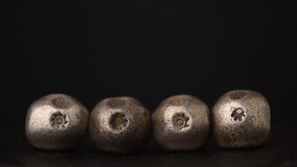 antique Thailand money coin on dark background