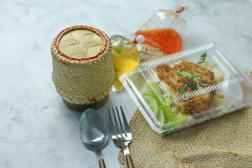 Hainanese chicken rice in lunch delivery box