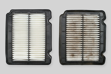Clean and dirty car air filters. Air filters close-up on a gray background.