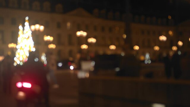 Soft focus people shopping on Christmas Streetscape Paris 