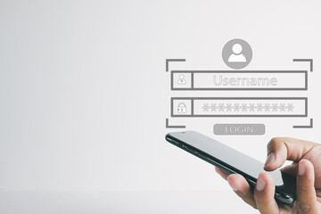 Cyber security,User Login,Cybersecurity,data protection concept.,Hand using smartphone with user login security interface over white background with copyspace use for technology idea.