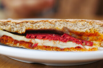  detail shot of club sandwich on wooden table