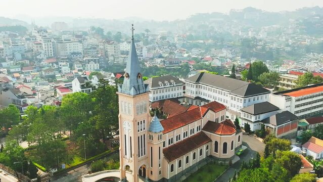 Aerial view outside Cathedral chicken on a morning in Da Lat, Vietnam. Old French architecture attracts parishioners to pray for peace at the weekend
