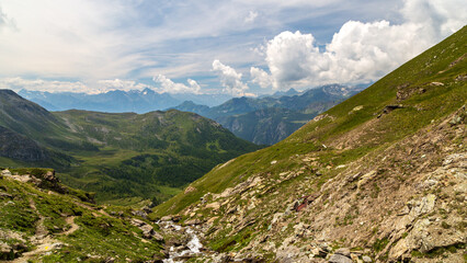 Summer trekking day in the mountains over Valtournanche