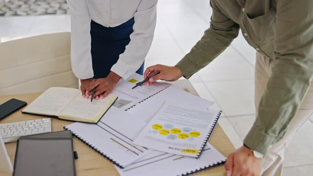 Planning, documents and team of people hands with infographics, data and business proposal for job workflow. Professional woman, partner or team talking with portfolio, paperwork and notebook design