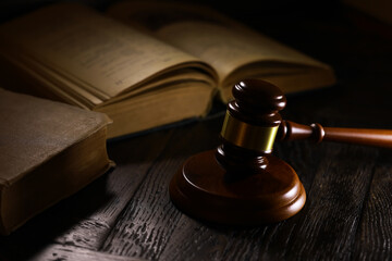 Judges gavel on wooden desk. Law firm concept.