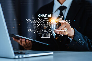 Chatbot chat AI concept, artificial intelligence Businessman using AI smart robot technology inputting commands Futuristic technology transformation.