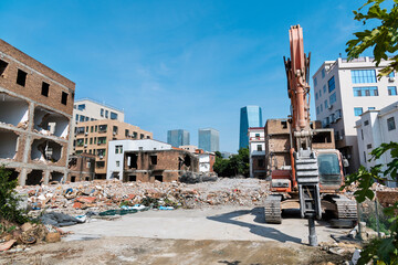 Construction machinery is demolishing the house