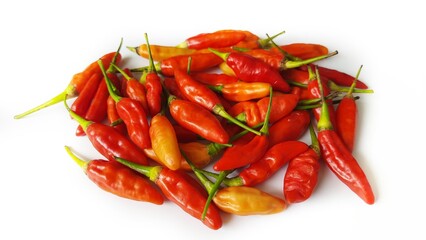 Cabe cabai rawit merah or Red cayenne pepper or Red hot chili pepper isolated on white background. Indonesian red chili chilli can be used with various dishes, cooking ingredients, and chili sauce