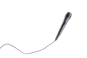 Obraz premium Black microphone with cable isolated on white background