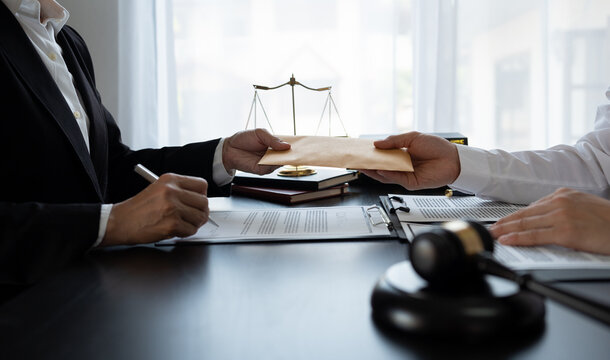 Businessman bribes officials or lawyers to commit corruption in lawsuits Unlawful acts of law enforcement by paying bribes to officials. Fraud concept, corruption