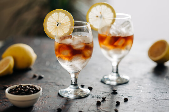 Espresso tonic beverage with coffee. Summer cold iced drink with ice still life photo