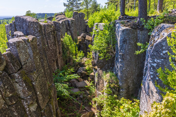 Ravine with rock pillar on a mountain