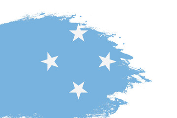 Federated States Of Micronesia flag on a stained stroke brush painted isolated white background with copy space