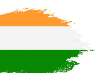 India flag on a stained stroke brush painted isolated white background with copy space