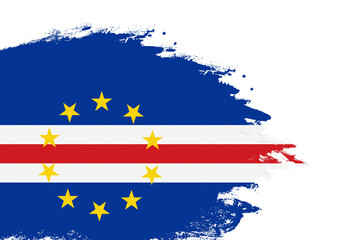 Cabo Verde flag on a stained stroke brush painted isolated white background with copy space