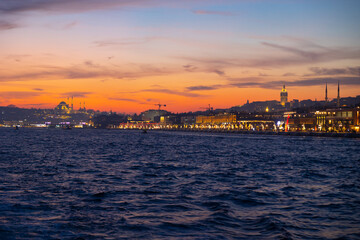 Fototapeta premium Istanbul view at sunset. Istanbul cityscape from a ferry.