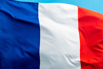 Obraz premium French flag waving on blue background