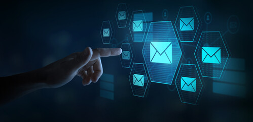 email marketing concept, many emails on touchscreen, company sending e-mails or digital newsletter to customers.