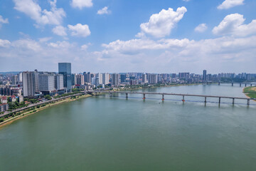 Fototapeta na wymiar Cityscape under the blue sky and white clouds in Zhuzhou, China