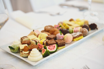 plate of homemade sweets - 605585872