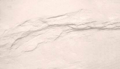 Surface of the white stone texture rough, gray-white tone. Use this for wallpaper or background image. There is a blank space for text...