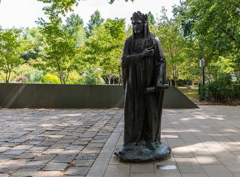 Statue of Dante Alighieri at World Literary Giant Square of Lu Xun Park, Hongkou, Shanghai, China on October 6, 2020. Great Italian poet of Middle Ages, father of Italian language.