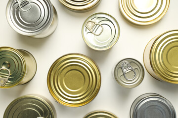 Canned food in blank metal jars, concept of canned food