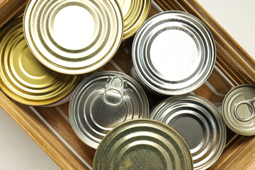 Canned food in blank metal jars, concept of canned food
