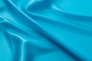 Close up of light blue silk background