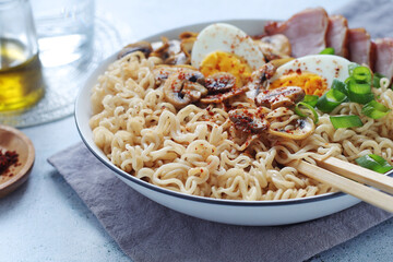 A bowl with ramen, an Asian noodle soup