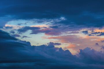 Dramatic sunset sky and clouds in a variety of colors from warm to cold