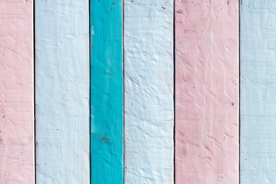 Texture of pastel colored wooden planks as background
