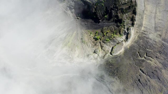 DRONE SHOT : VERTICAL SHOT OF PARICUTIN VOLCANO CRATER AND CLOUDS